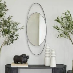 Metal Oval Wall Mirror - CosmoLiving By Cosmopolitan 16 Metal Oval Wall Mirror - CosmoLiving By Cosmopolitan -Home Decor Store GUEST b3596ba8 a36b 4062 abf9 e612b45822fa