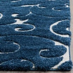 2'3"x4' Swirl Loomed Accent Rug Dark Blue/Cream - Safavieh